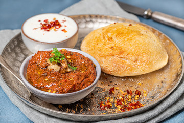 Muhammara with hommade bread and yogurt sauce