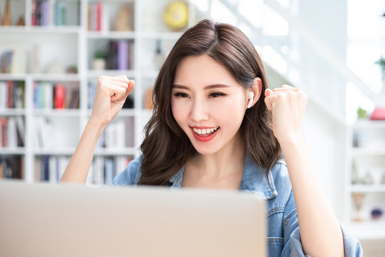 student using laptop at home