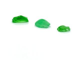 Rounded shards made from green bottle glass