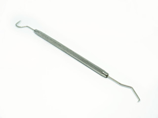 Double hook. Dental toolsisolated on white.