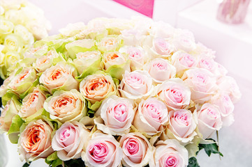 Romantic bouquet of peony pink and green roses. Selective focus, close-up