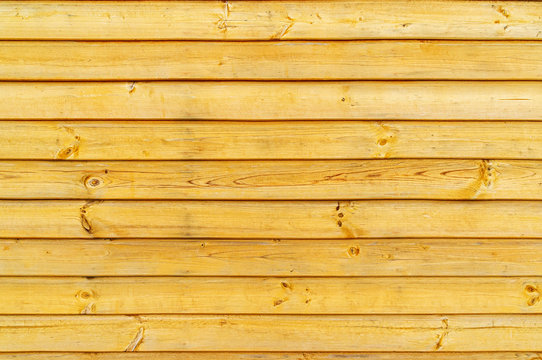 Untreated wood, wooden lattice fence or wall without attachment. Close up. Background