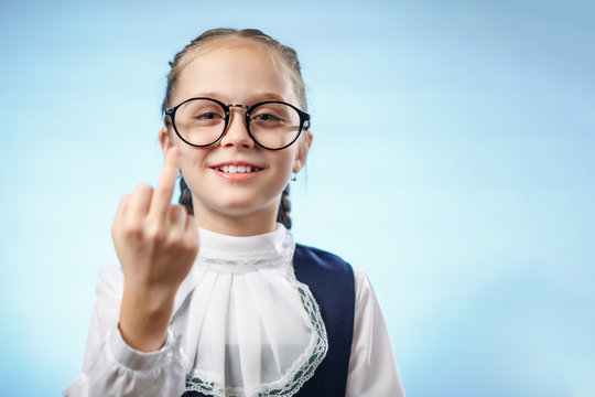 Naughty Schoolgirl Laughing and Showing Middle Finger Portrait