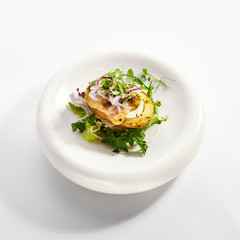 Baked potato with egg and pickled onion