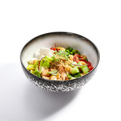 Bowl of couscous with shrimp and vegetables