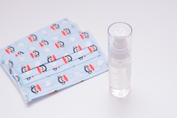 Protective mask, disinfectants. Hygiene concept. prevent the spread of germs and bacteria and avoid infection with the crown virus.