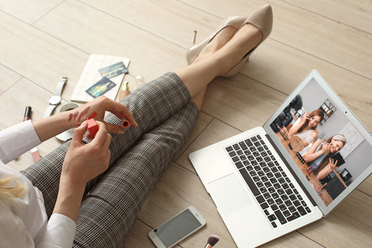 Female Makeup Artist With Laptop At Home