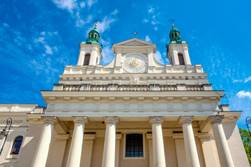 Fototapeta na wymiar Lublin, Poland - Facade of St. John the Baptist Cathedral - archikatedra Sw. Jana Chrzciciela - in historic old town quarter