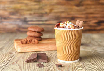 Cup of hot chocolate on table
