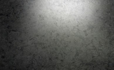 Dark marble wall texture. Low light top on black stone background.