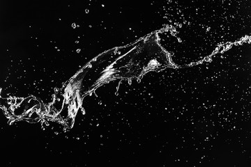 Splash of clean water on dark background