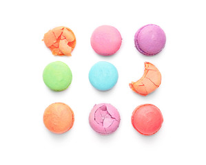 Tasty macarons on white background