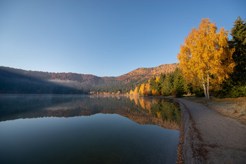 Calm lake on a sunny autumn day