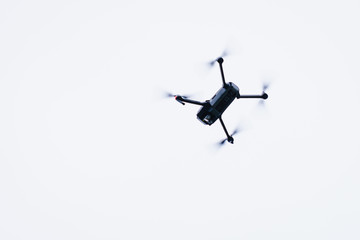 Drone flying over sky background