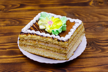 Tasty sweet cake on a wooden table