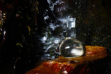 Glass flask with clear water.