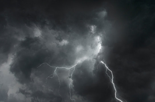 Strong lightning in scary black clouds in monsoon season