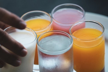 set of refreshing drink. orange juice, guava juice and cold water 