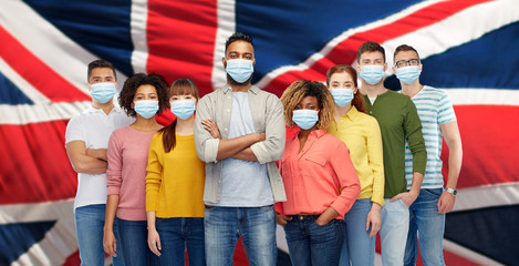health, safety and pandemic concept - group of people wearing protective medical masks for...