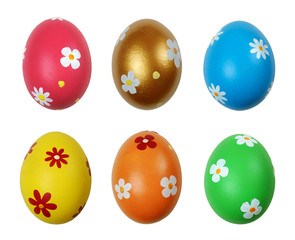 Set of colorful Easter eggs reflecting on the white background