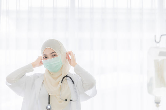 Muslim Female Doctor Prepare For Work.