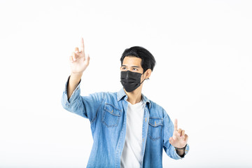 Fototapeta premium Asian young man with light hair in a medical protective mask, Coronavirus and Air pollution pm2.5 concept.