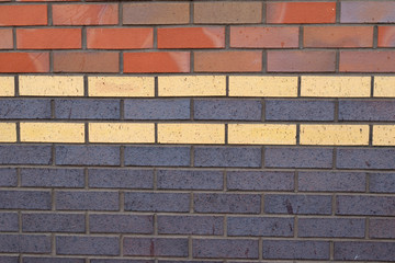 Close Up of Brick Wall with Multi Coloured Layers 