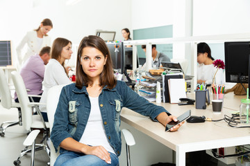 Obraz premium female manager sitting at her workplace