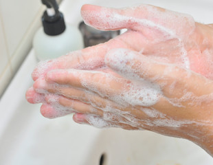 Coronavirus pandemic prevention wash hands with soap.Personal hygiene concept.