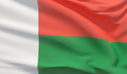 Waving national flag of Madagascar. Waved highly detailed close-up 3D render.