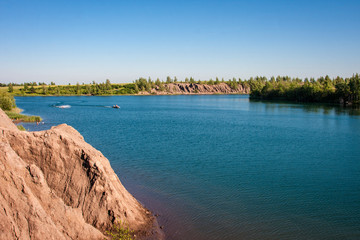 Beautiful water, shore, lake, forest and sky