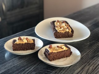 Vegan chickpea chocolate brownie with peanut butter and hazelnuts