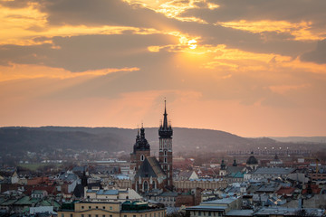 Fototapeta na wymiar View to Cracow - St Mary's Church, Market during sunset