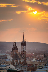 Naklejka premium View to Cracow - St Mary's Church, Market during sunset