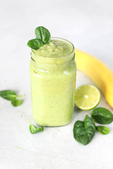 Smoothies with banana, avocado, spinach, lime