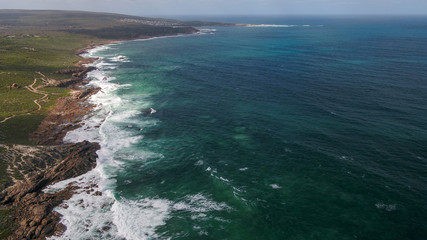 Aerial Drone Images Grace Town waves crashing over Rocks Perth Western Australia 