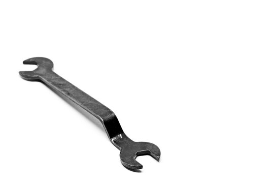 a bent screw tool, similar to a wrench