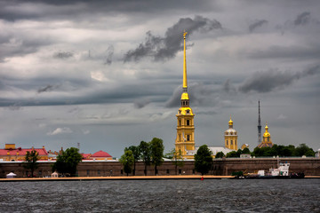 Fototapeta premium Fortress with a tall tower on an island under the sky