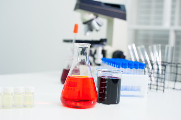 Chemical solution bottles for scientific experiments.