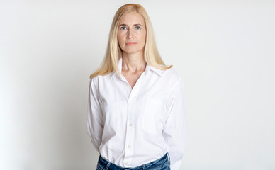 Natural beauty. Middle-aged woman looking at camera