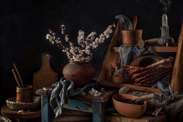 Branches of apricots in bloom on an old vintage wooden background. country style. Still life. Spring. Flowering fruit trees. © Алексей Шмуль