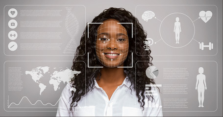 Facial verification of African American lady on grey background, double exposure with virtual screen and digital data