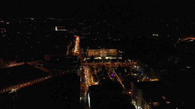 Syntagma square by night aerial drone shot coming closer