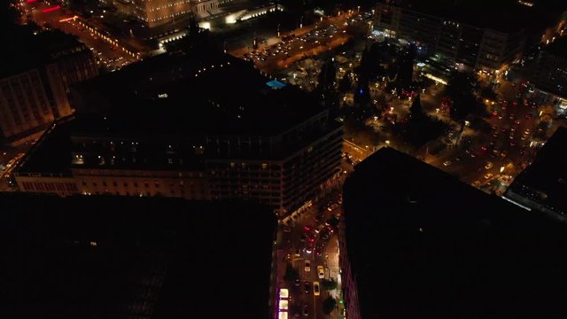 Syntagma square by night aerial drone shot tilt