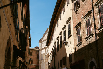 Medieval street in old Italian hill town. Tuscany, Italy