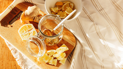 Honey, lemon and ginger on old wooden table