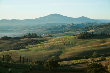 Obraz premium Foggy valley in the Tuscany, Val d Orcia, Italy