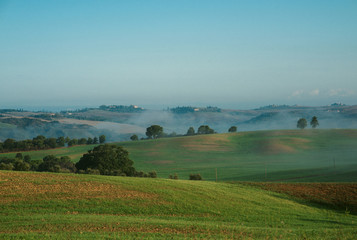 Early foggy morning on Tuscany, countryside, Italy