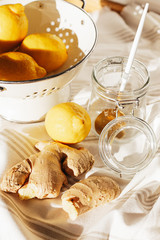 Honey, lemon and ginger on old wooden table