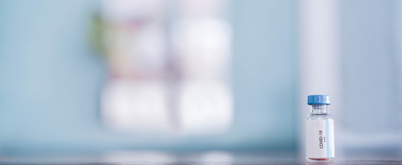 close up on vaccine bottle for fight and protect coronavirus (MERS-n COV) at medical laboratory concept